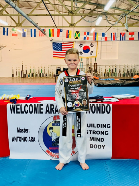 Jr. Instructor Cane demonstrating focus and balance